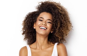 Patient in Fountain Valley smiling with dental implants