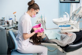 a patient receiving dental care from a dentist near Tyler