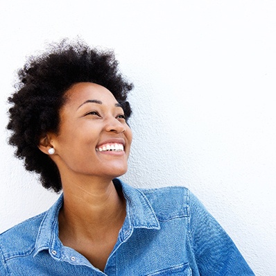 Young woman showing off her smile makeover in Fountain Valley