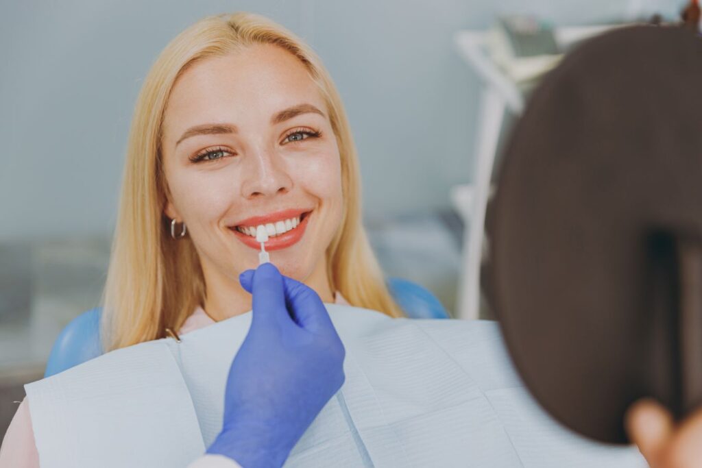 A woman getting porcelain veneers.